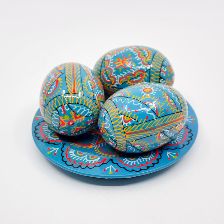 UKRAINIAN WOODEN PYSANKY HAND DECORATED EASTER EGGS ON A PLATE TEAL