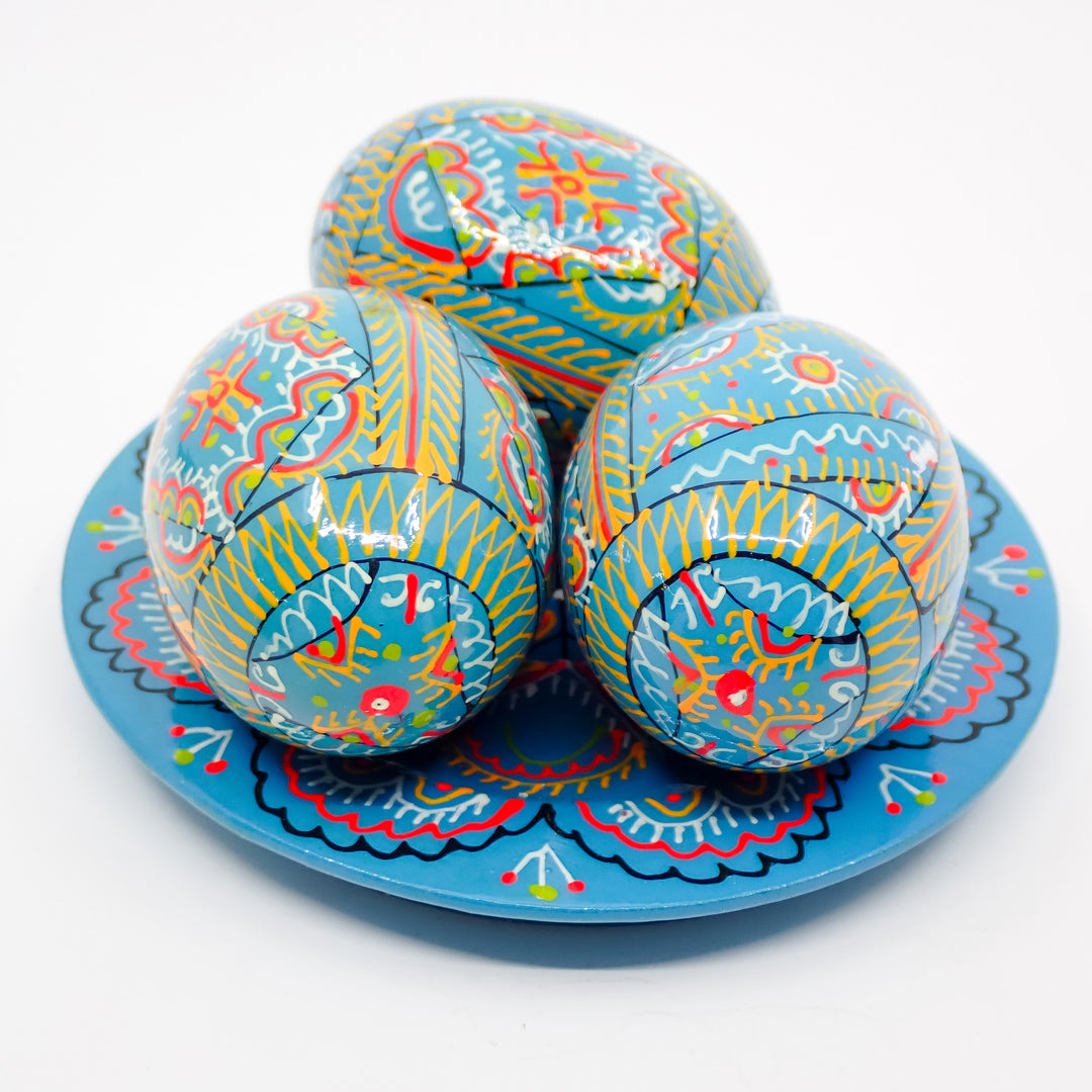UKRAINIAN WOODEN PYSANKY HAND DECORATED EASTER EGGS ON A PLATE TEAL